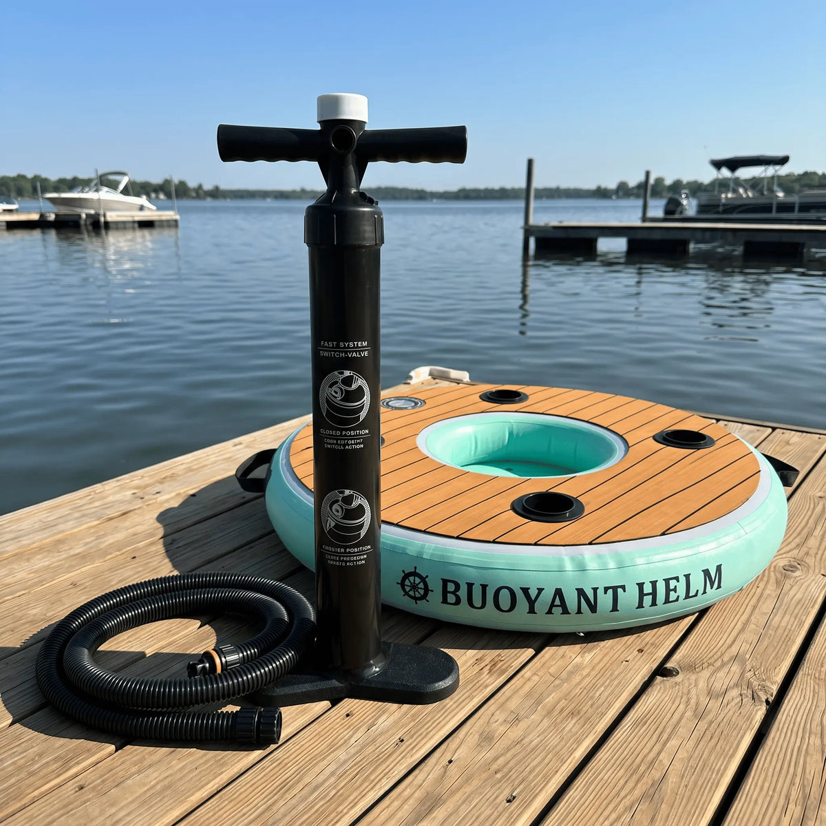 Buoyant Helm floating bar and pump on a dock beside a lake