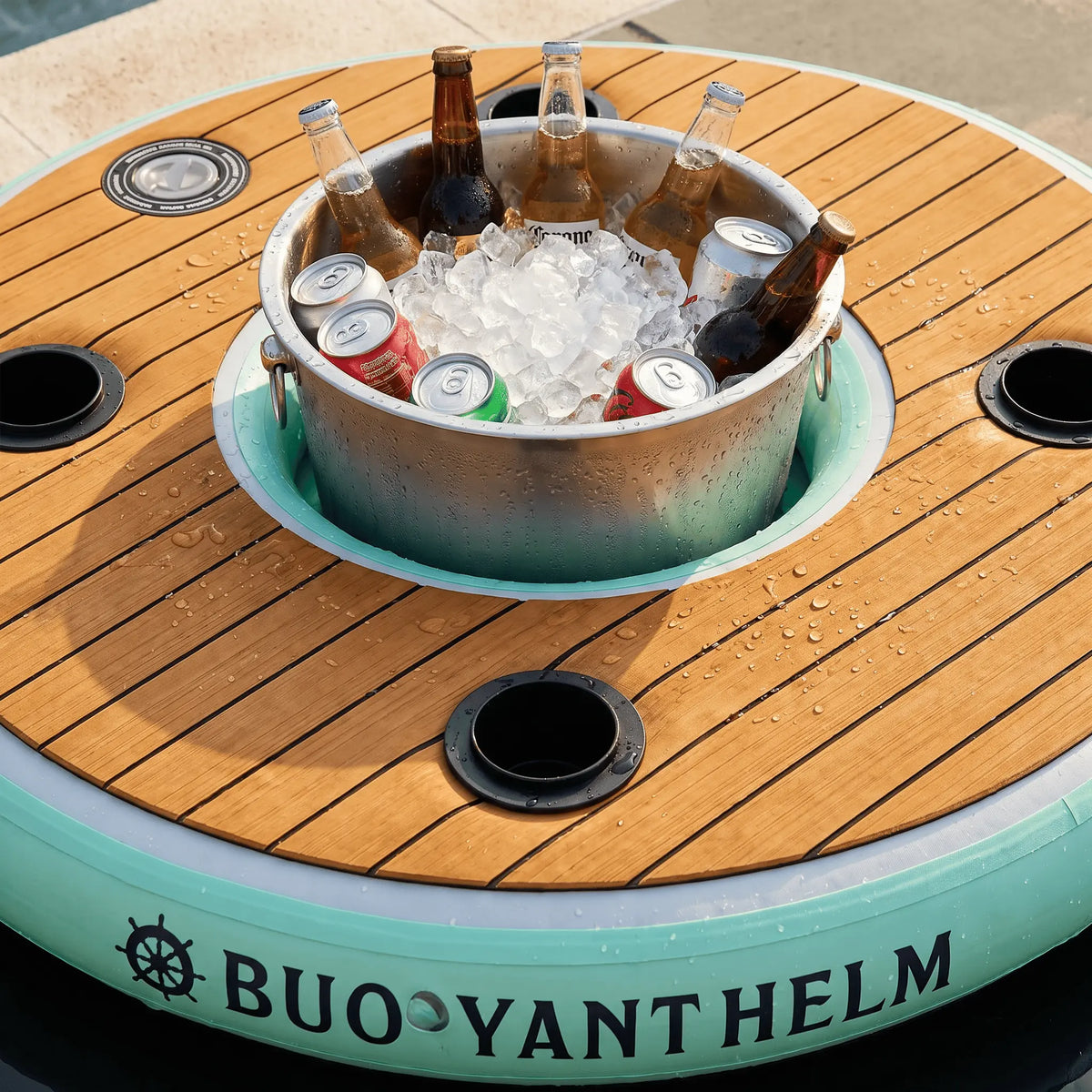 Ice bucket and drinks set into the Buoyant Helm floating bar tabletop
