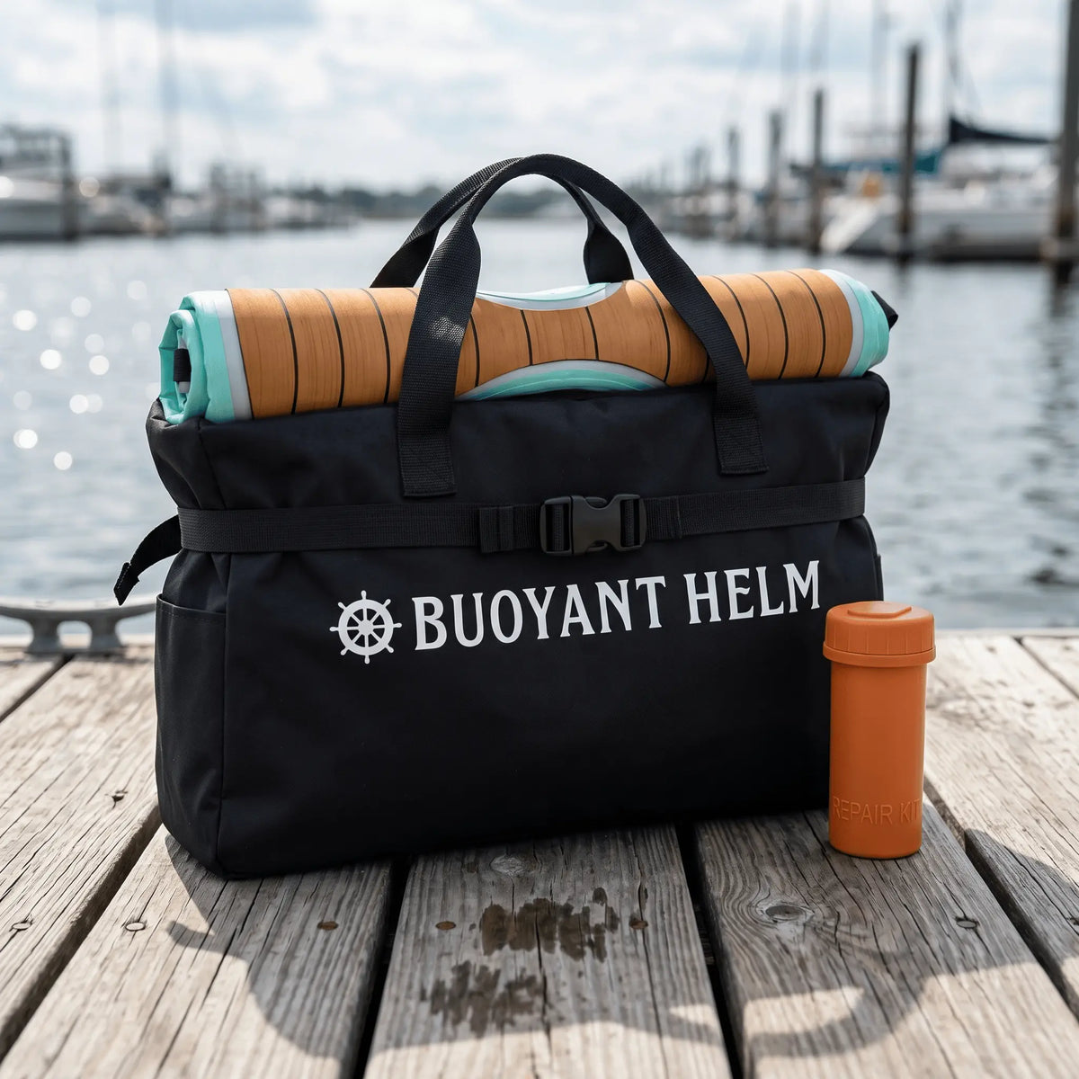Packed floating bar and accessories in a storage bag on a dock
